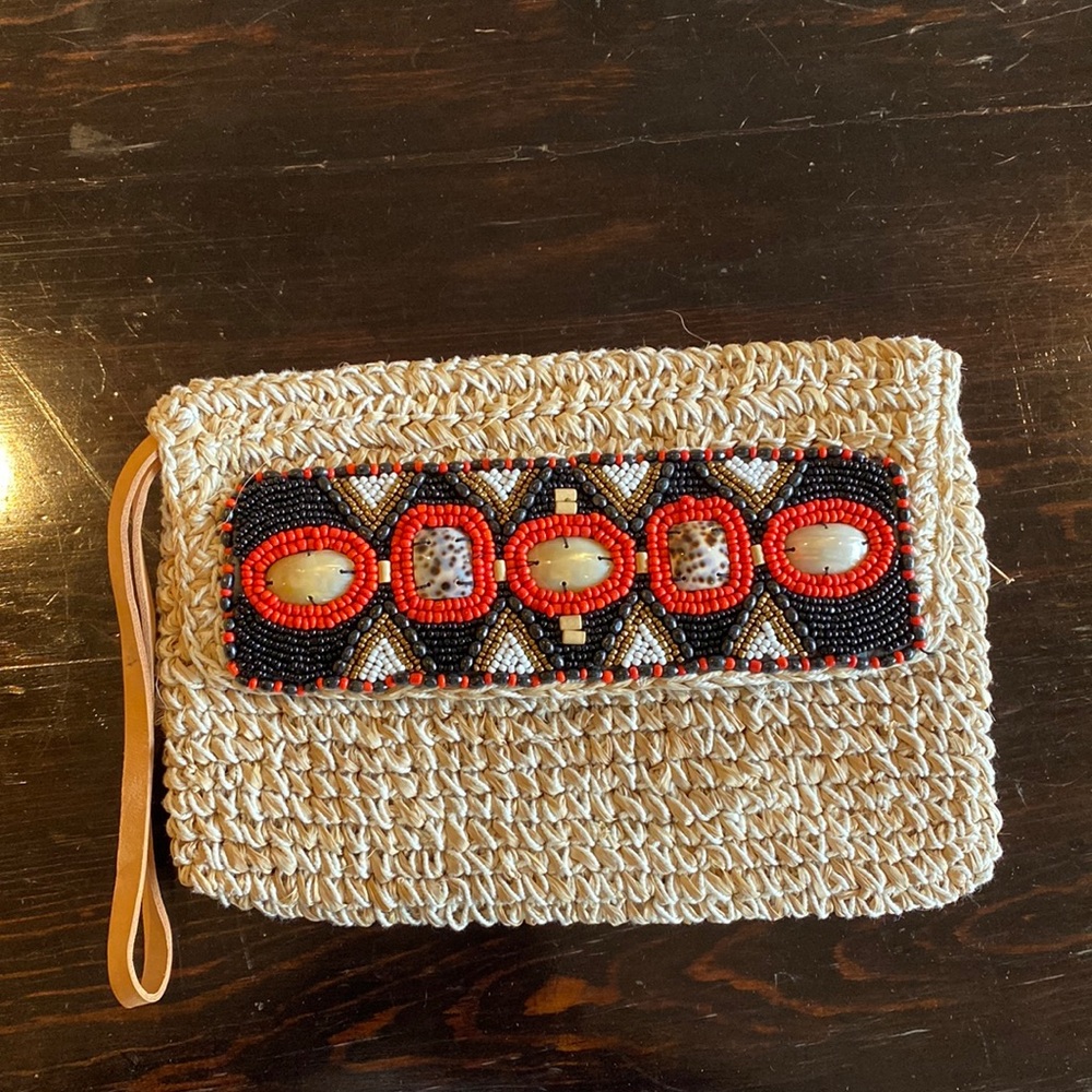 Tan macrame clutch